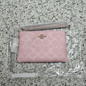 Coach Corner Zip Wristlet In Signature Canvas With Charms (Powder pink)